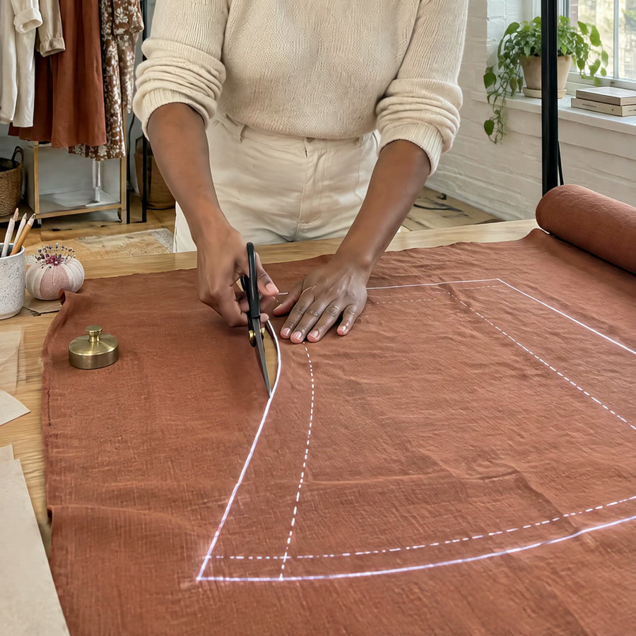 Cutting fabric along a projected line